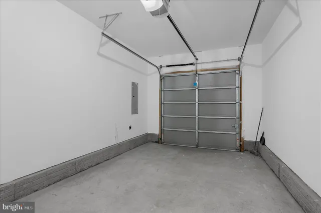 a view of yard with swimming pool and green space