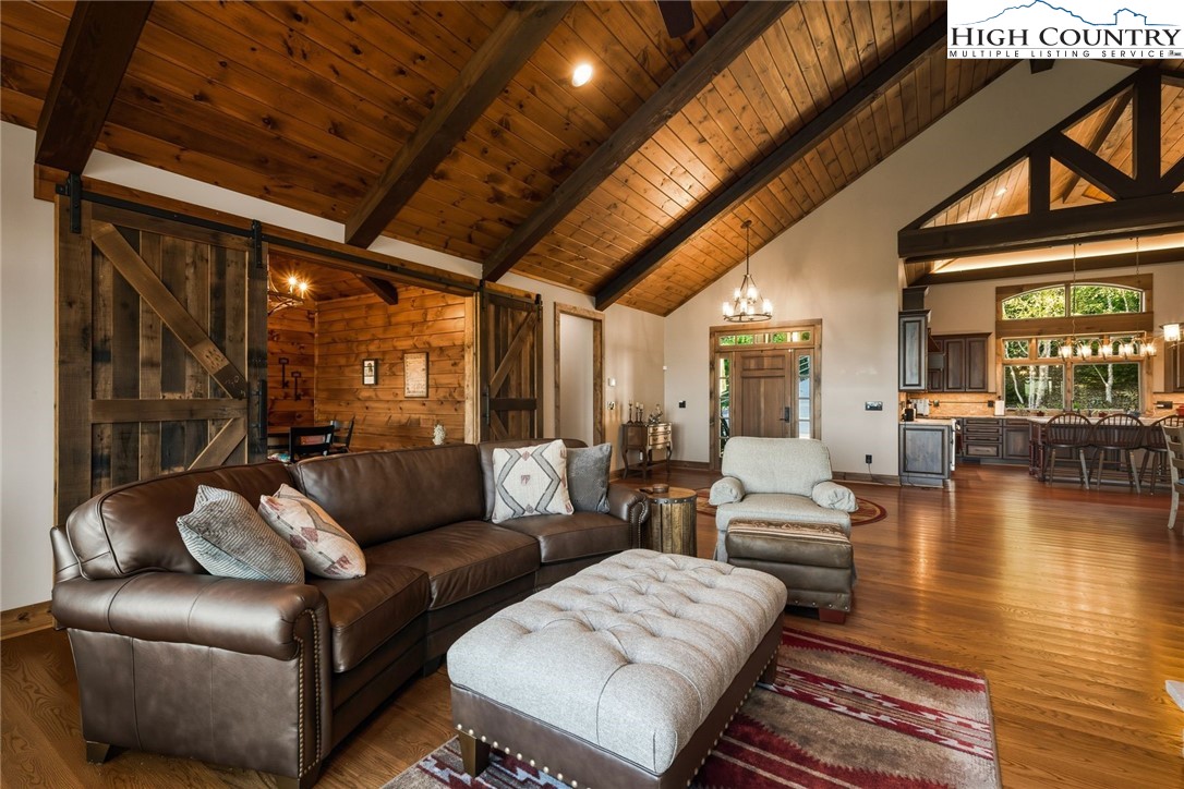 550 Big Sky Road Ferguson, NC 28624 - Photo 11 of 35 a living room with furniture and a large window