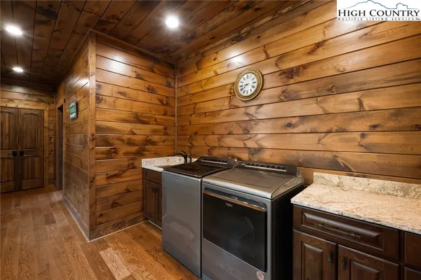 a utility room with washer and dryer