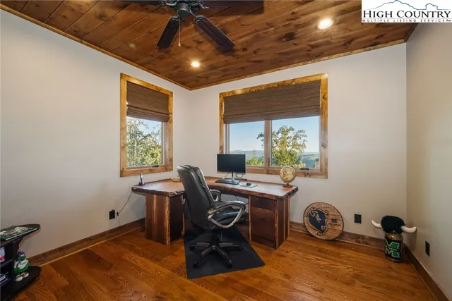 a workspace with furniture and window