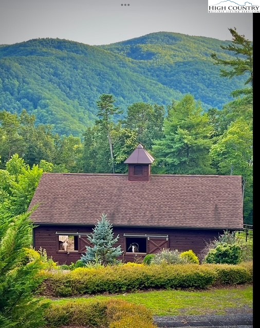 550 Big Sky Road Ferguson, NC 28624 - Photo 24 of 35 a aerial view of a house with a garden and a yard