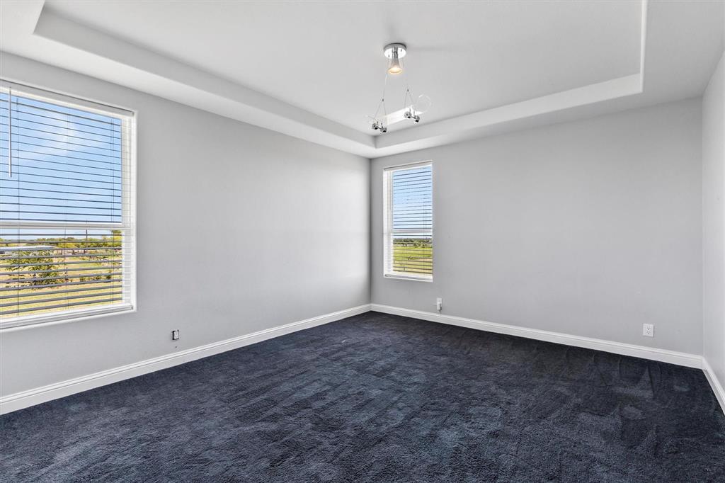 9583 Neal Road Forney, TX 75126 - Photo 16 of 34 a view of an empty room with a window