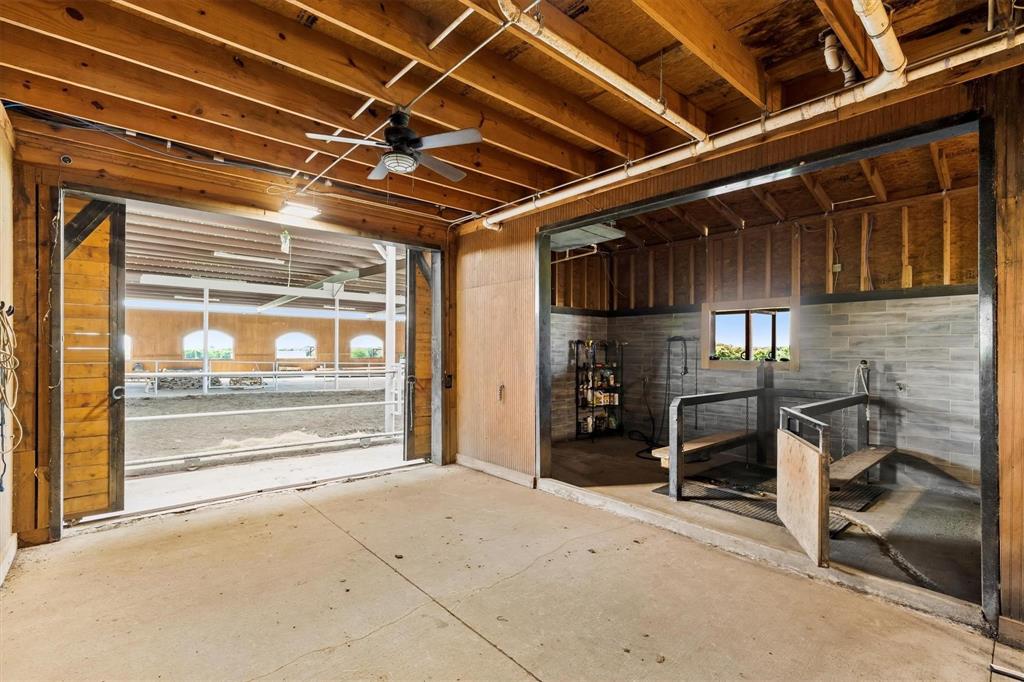 9583 Neal Road Forney, TX 75126 - Photo 28 of 34 a view of a room with wooden walls