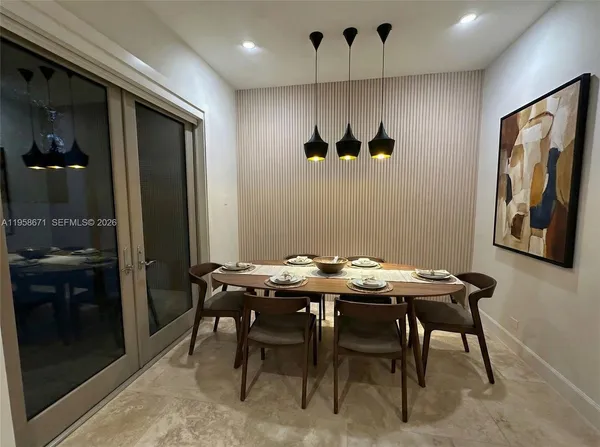 a view of a dining room with furniture