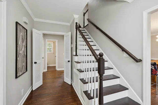 a view of entryway with wooden floor