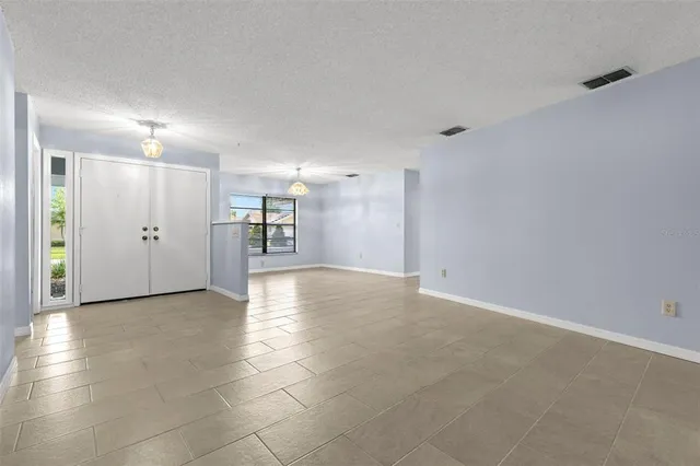 an empty room with a bathroom