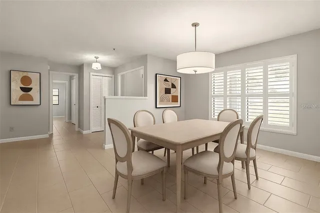 a view of a dining room with furniture window and outside view