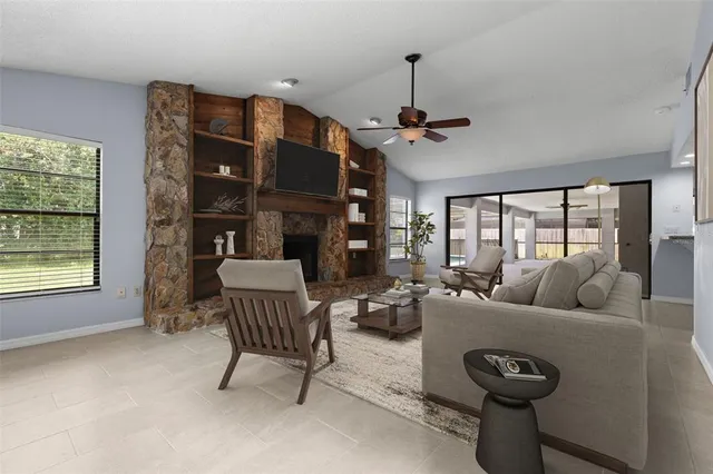 a living room with furniture and a window