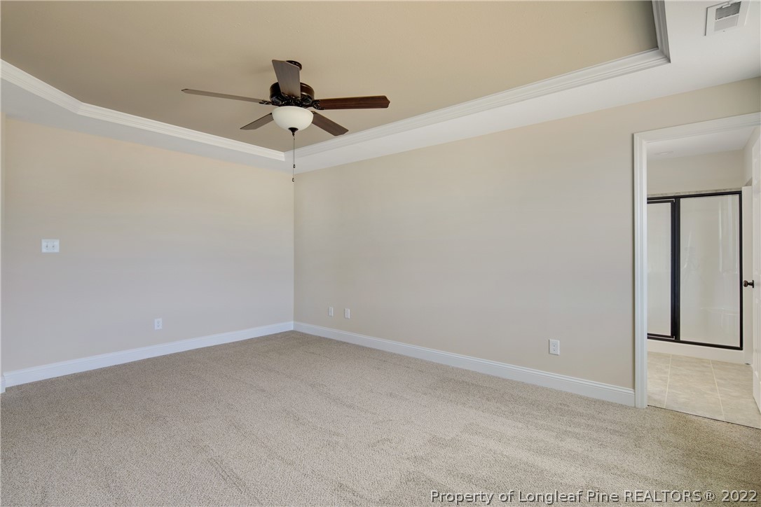 2605 Riddle Farm Hope Mills, NC 28348 - Photo 27 of 50 an empty room with a ceiling fan and a window