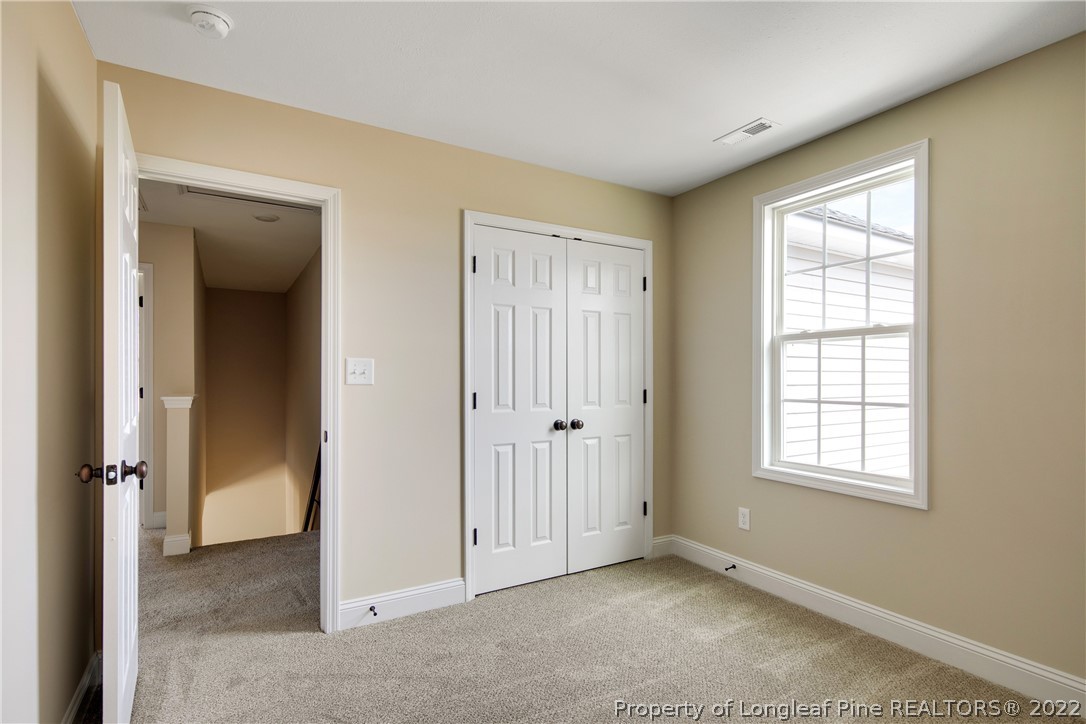 2605 Riddle Farm Hope Mills, NC 28348 - Photo 34 of 50 a view of an empty room with closet and a window