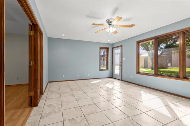 a view of an empty room and window