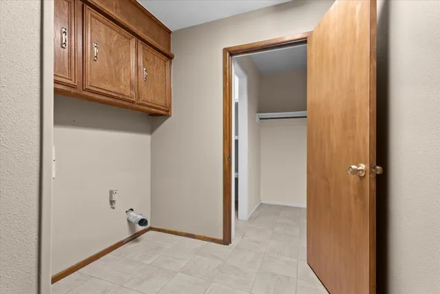 a view of an empty walk in closet