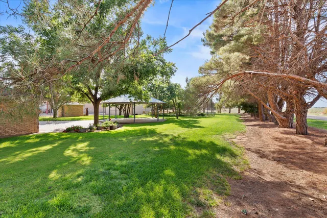 a view of a house with a big yard
