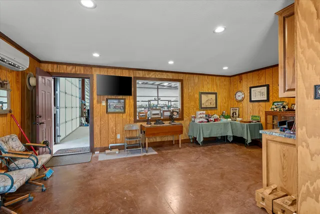 an aerial view of a residential houses with outdoor space