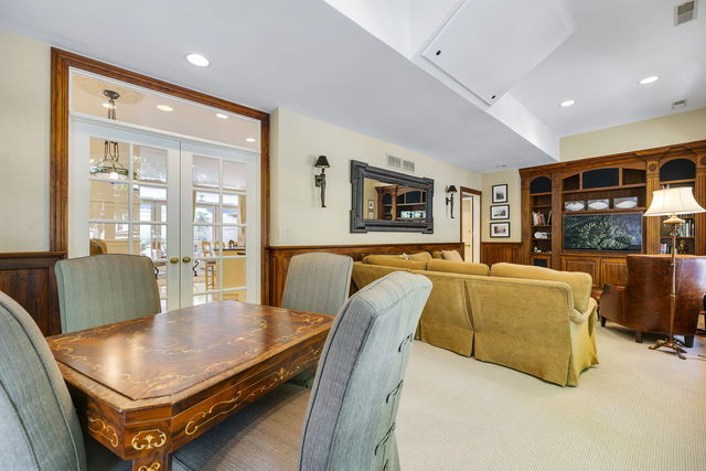 45 East Cedar Street, Unit 200 Chicago, IL 60611 - Photo 11 of 35 a living room with furniture pool table and a large window