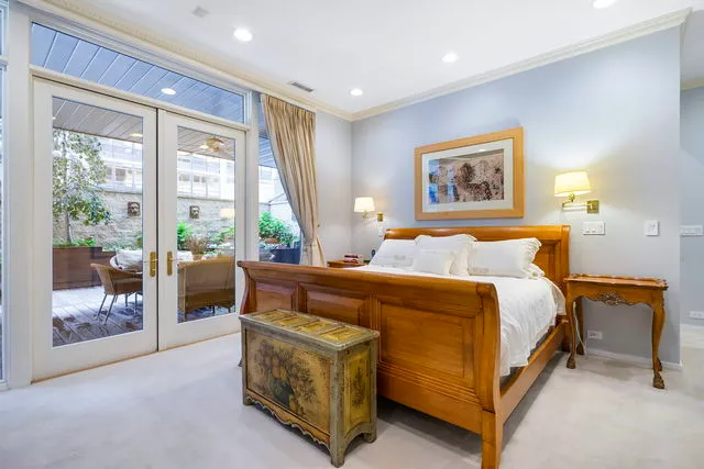 a bed room with a bed and a painting