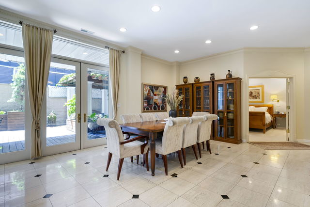 45 East Cedar Street, Unit 200 Chicago, IL 60611 - Photo 9 of 35 a view of a dining room with furniture