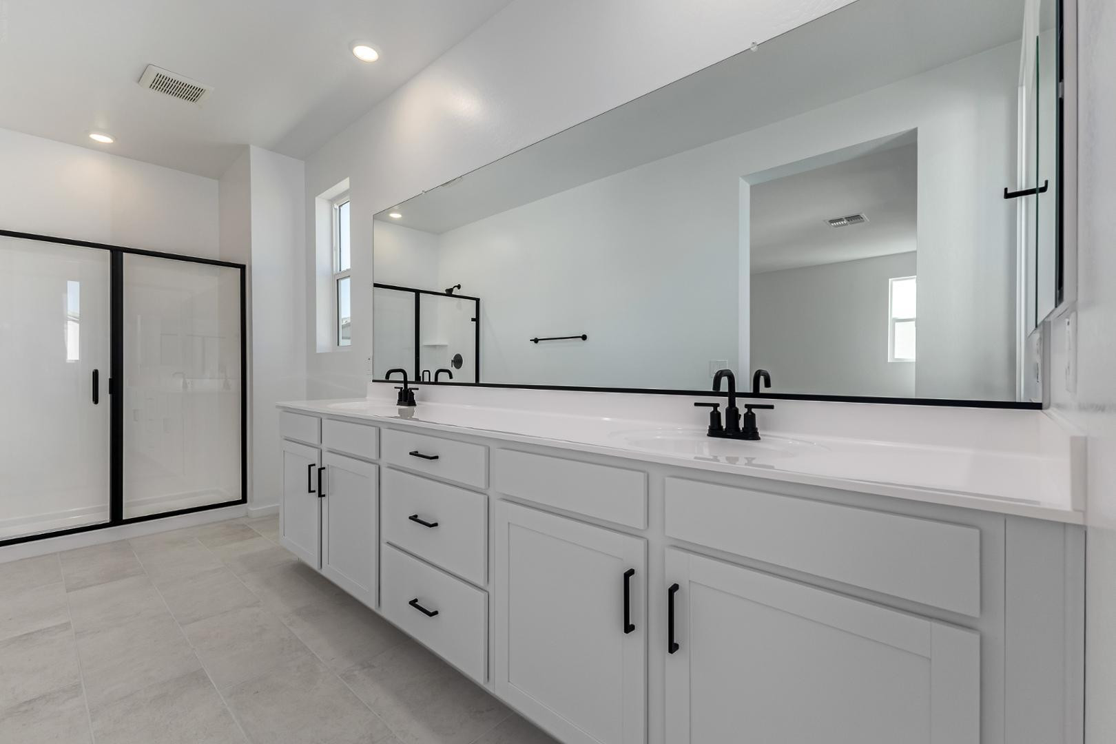 2436 West Maximo Way Phoenix, AZ 85085 - Photo 20 of 37 a bathroom with a double vanity sink and mirror