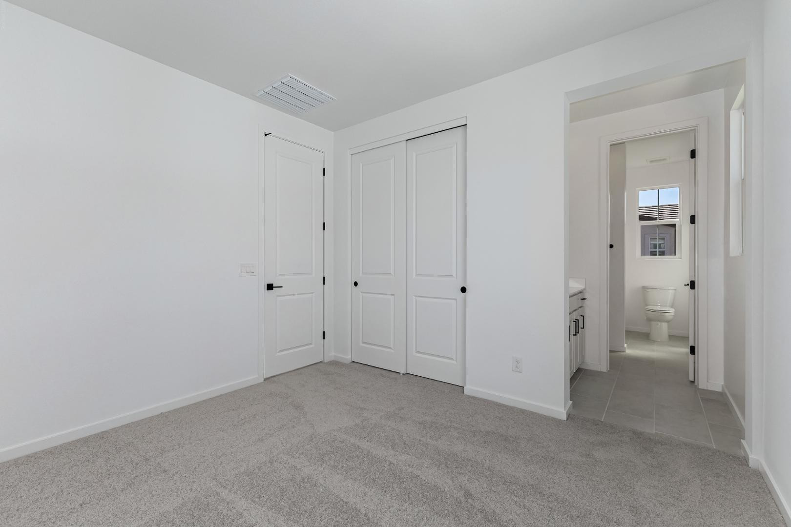 2436 West Maximo Way Phoenix, AZ 85085 - Photo 26 of 37 wooden floor and closet in a room