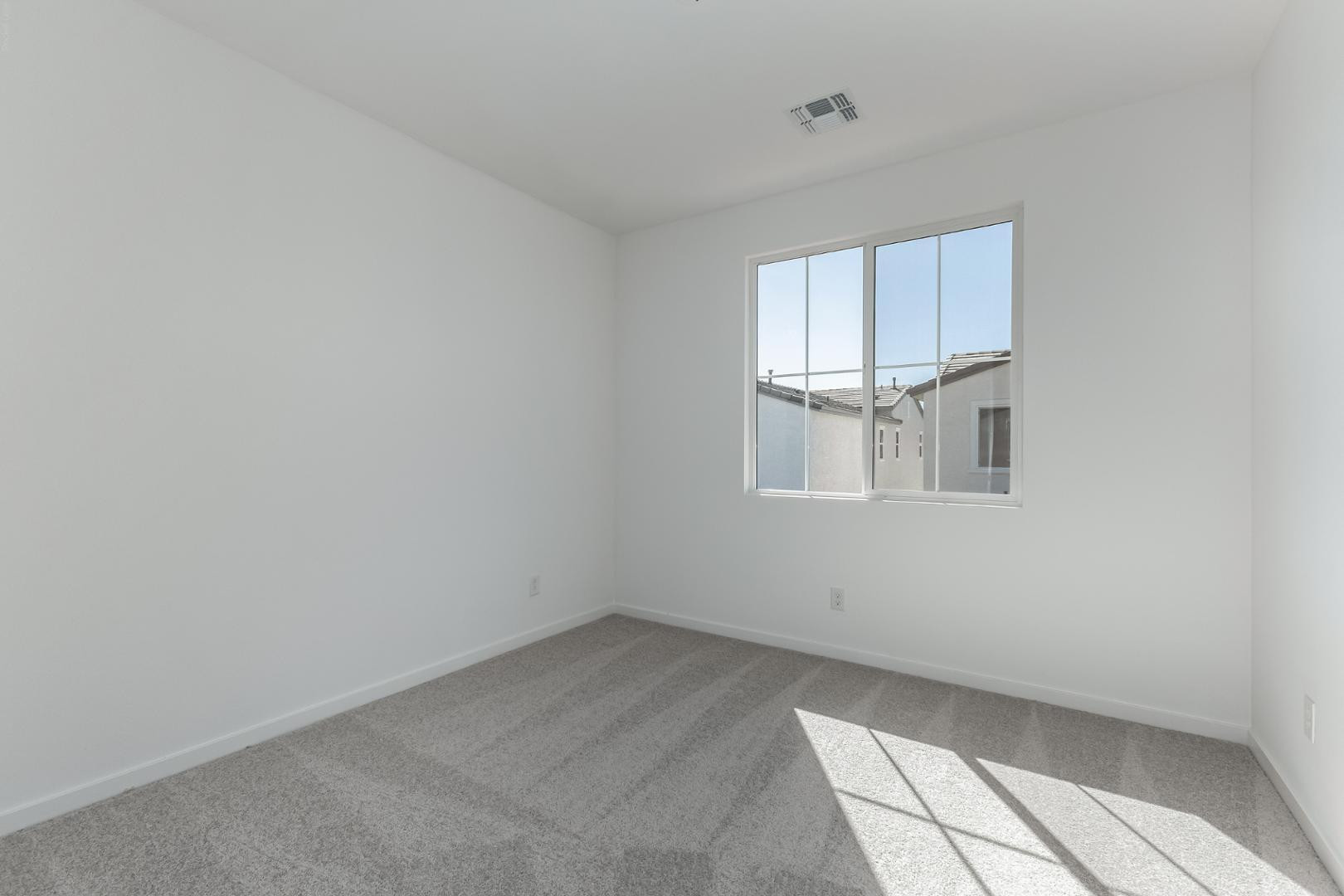 2436 West Maximo Way Phoenix, AZ 85085 - Photo 33 of 37 a view of an empty room with a window