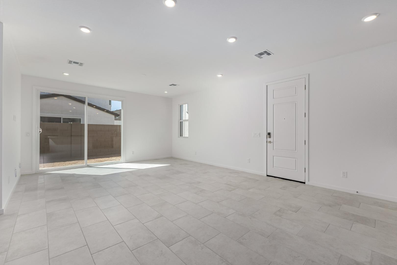2436 West Maximo Way Phoenix, AZ 85085 - Photo 7 of 37 a view of an empty room with a window