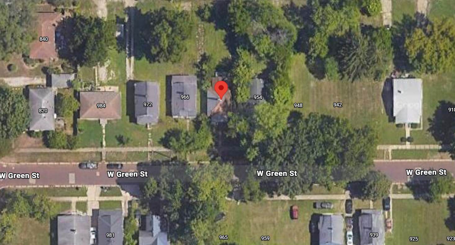 960 West Green Street Decatur, IL 62522 - Photo 5 of 6 an aerial view of a house with a yard and large trees