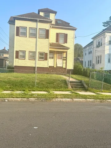 a view of a house with a swimming pool