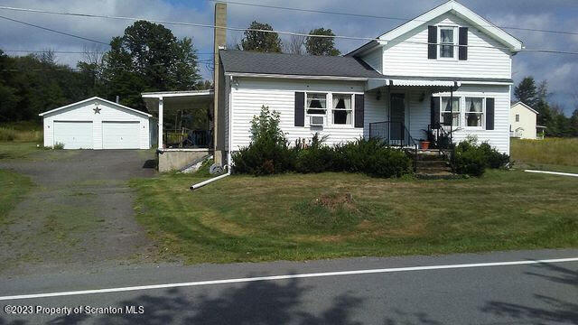 2795 Aberdeen Road Moscow, PA 18444 - Photo 13 of 19 a front view of a house with garden