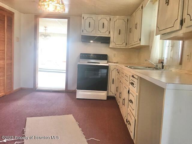 2795 Aberdeen Road Moscow, PA 18444 - Photo 2 of 19 a kitchen with stainless steel appliances granite countertop a stove a sink and a refrigerator