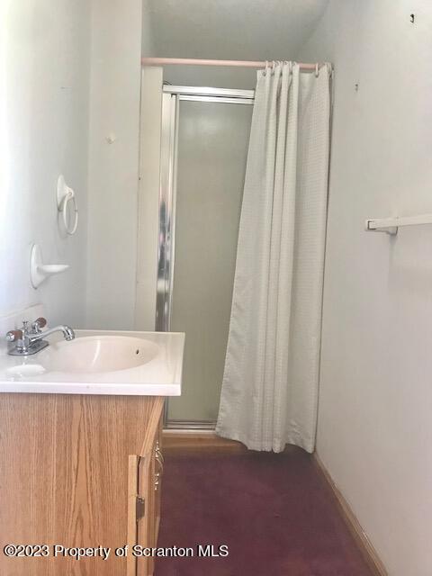 2795 Aberdeen Road Moscow, PA 18444 - Photo 9 of 19 a bathroom with a sink and a mirror