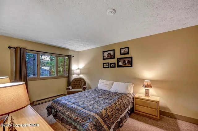 a view of a water fountain in front of a house
