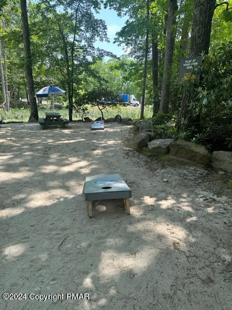 103 Telemark Lake Harmony, PA 18624 - Photo 65 of 68 a view of a backyard with table and chairs