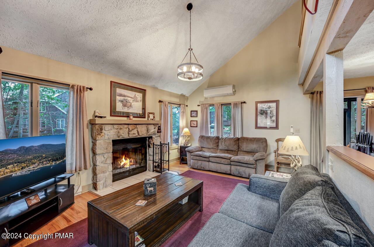 103 Telemark Lake Harmony, PA 18624 - Photo 7 of 68 a living room with furniture and a fireplace