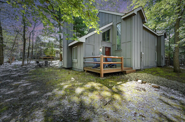 103 Telemark Lake Harmony, PA 18624 - Photo 8 of 68 a view of backyard with wooden fence and large trees