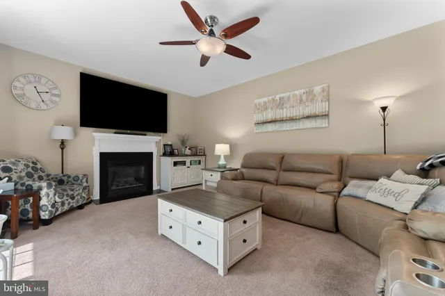 a bathroom with a sink a mirror and vanity