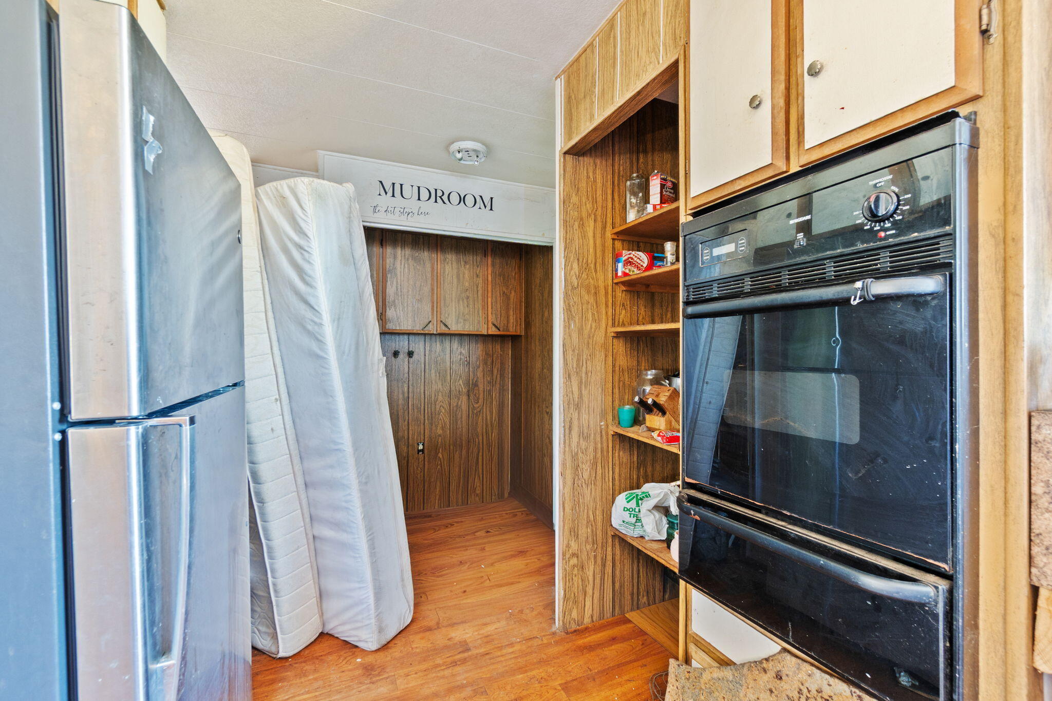 13957 Gas Point Road Igo, CA 96047 - Photo 6 of 18 a kitchen with a refrigerator and a stove