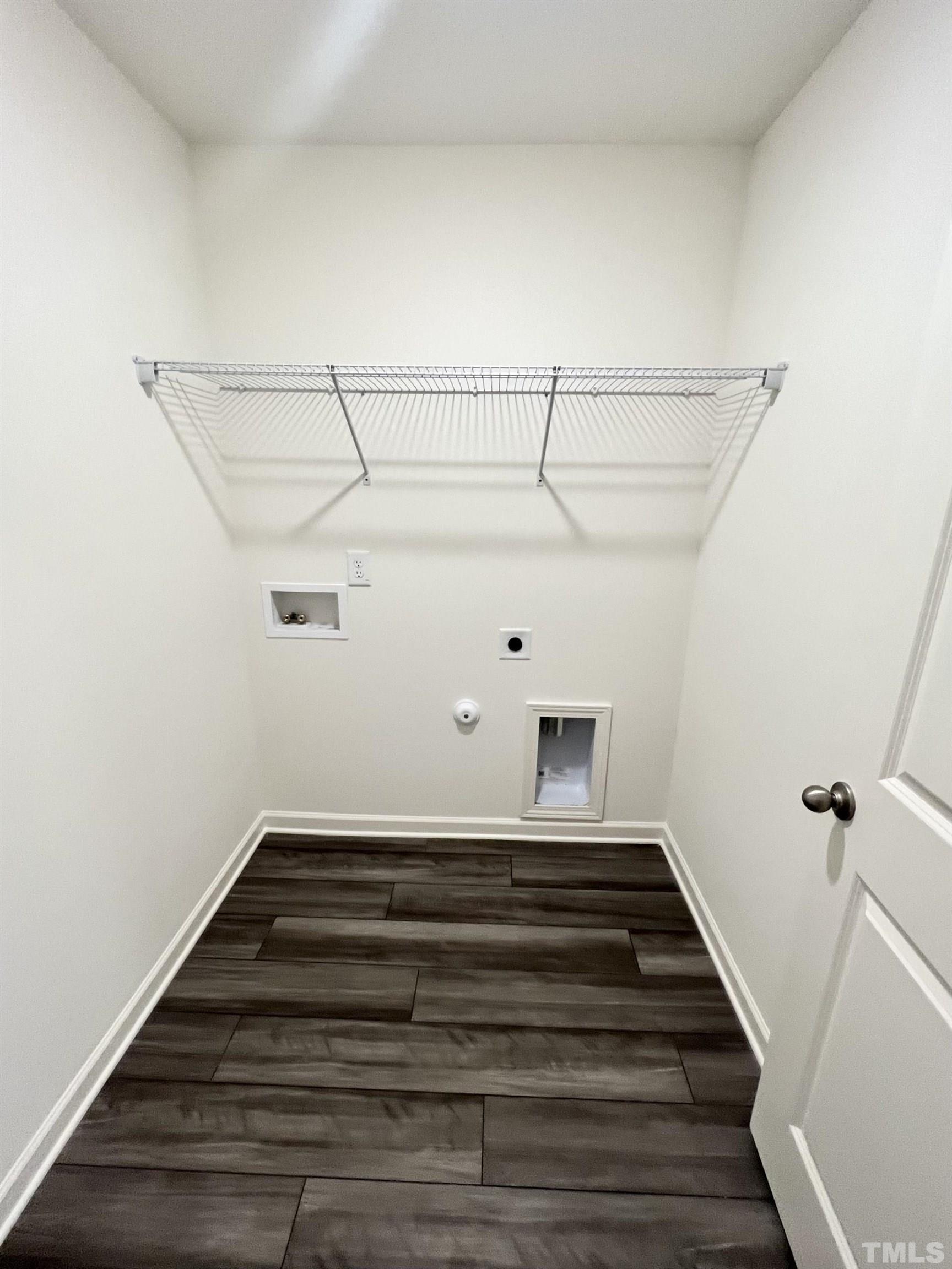 3403 C Walker Drive Wilson, NC 27893 - Photo 18 of 26 a view of a room with racks on the wall