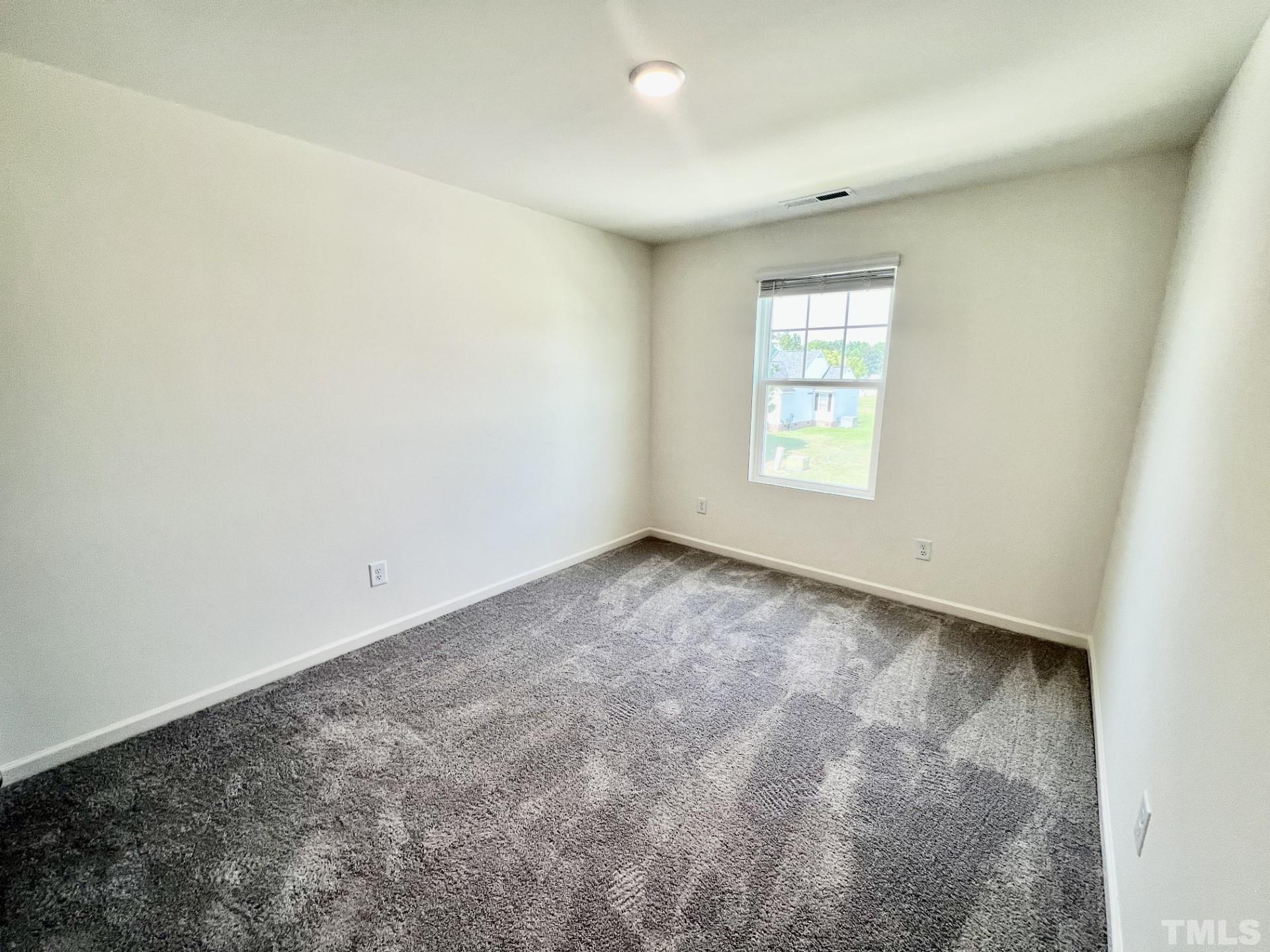 3403 C Walker Drive Wilson, NC 27893 - Photo 19 of 26 an empty room with a window