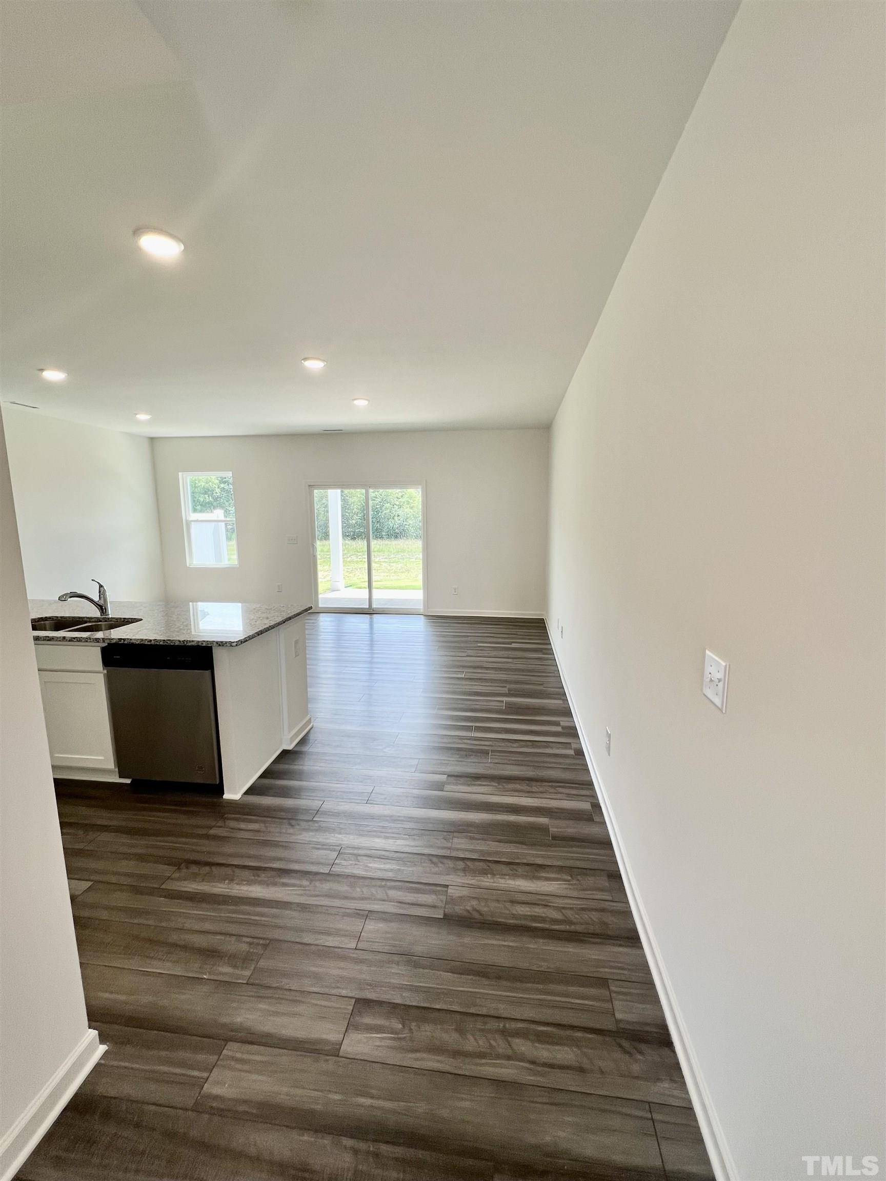 3403 C Walker Drive Wilson, NC 27893 - Photo 4 of 26 a view of kitchen and hall with wooden floor