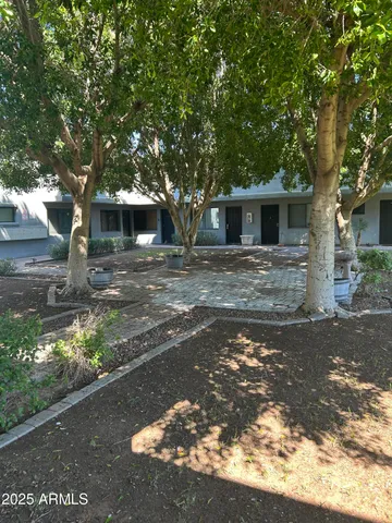 a front view of a house with yard