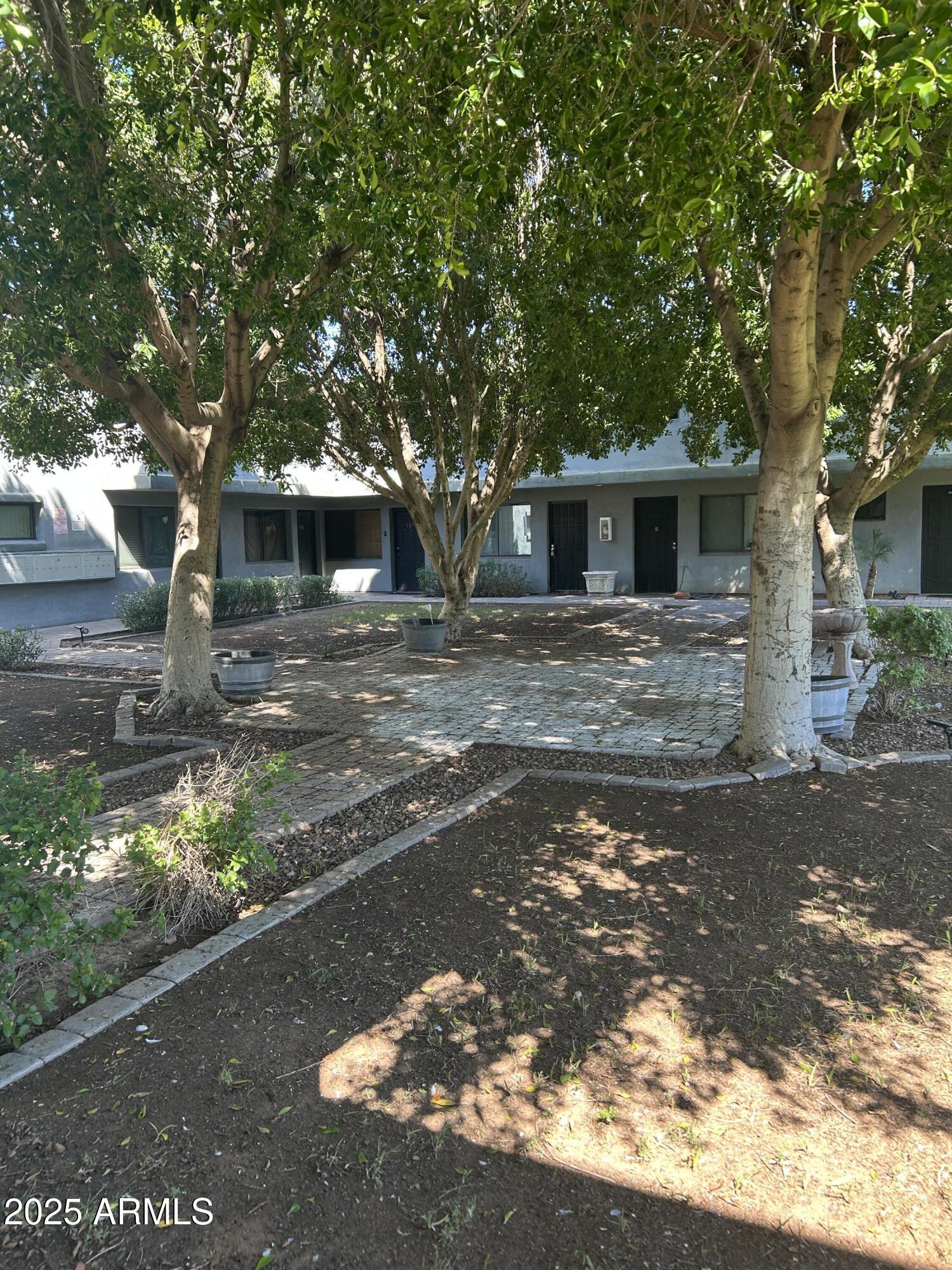 a front view of a house with yard