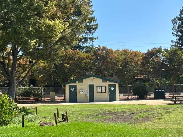 a house view with a sitting space and garden