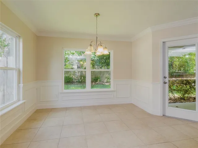 a view of a room that has a window in it