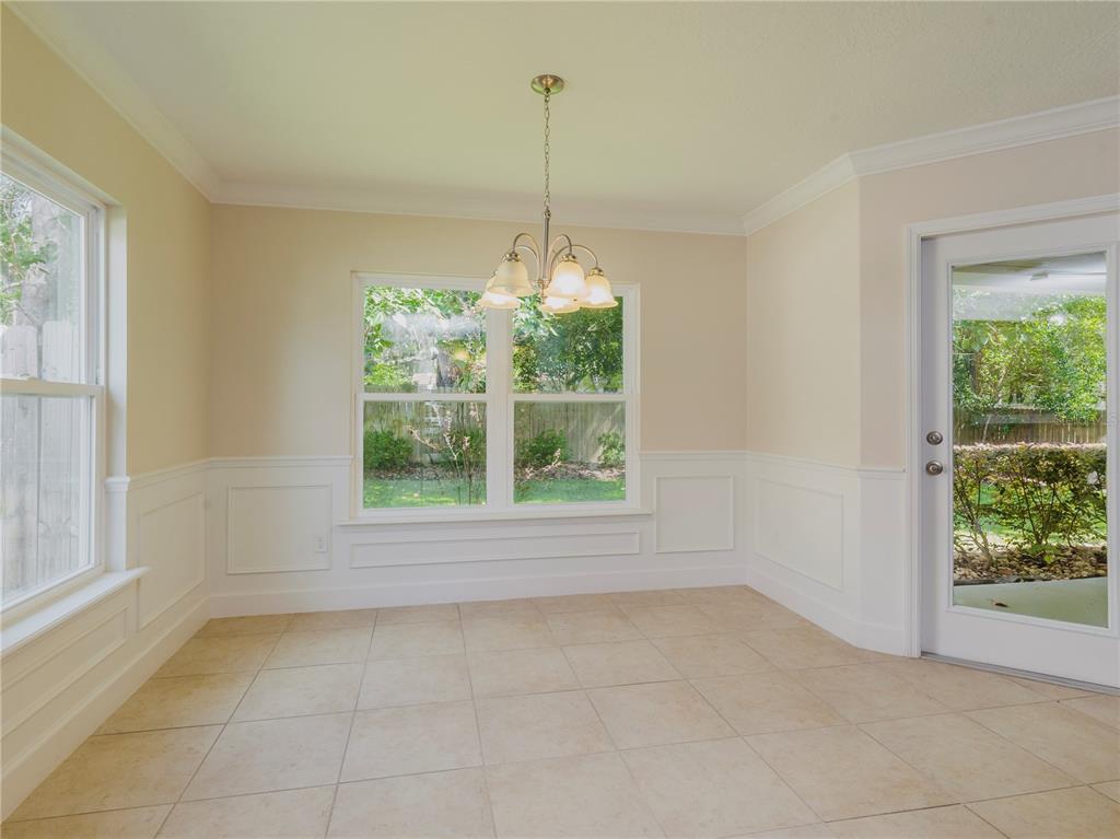 1642 Northwest 34th Avenue Gainesville, FL 32605 - Photo 5 of 14 a view of a room that has a window in it