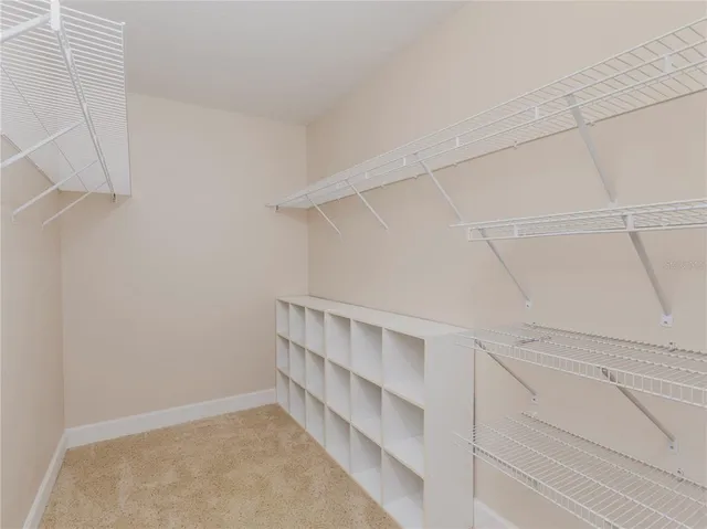 a view of an empty walk in closet