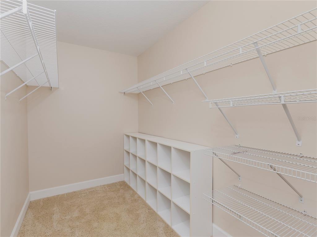 1642 Northwest 34th Avenue Gainesville, FL 32605 - Photo 8 of 14 a view of an empty walk in closet