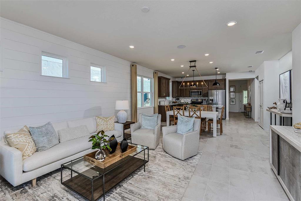 2364 Daisy Tree Road St. Cloud, FL 34771 - Photo 16 of 31 a living room with furniture and view of kitchen