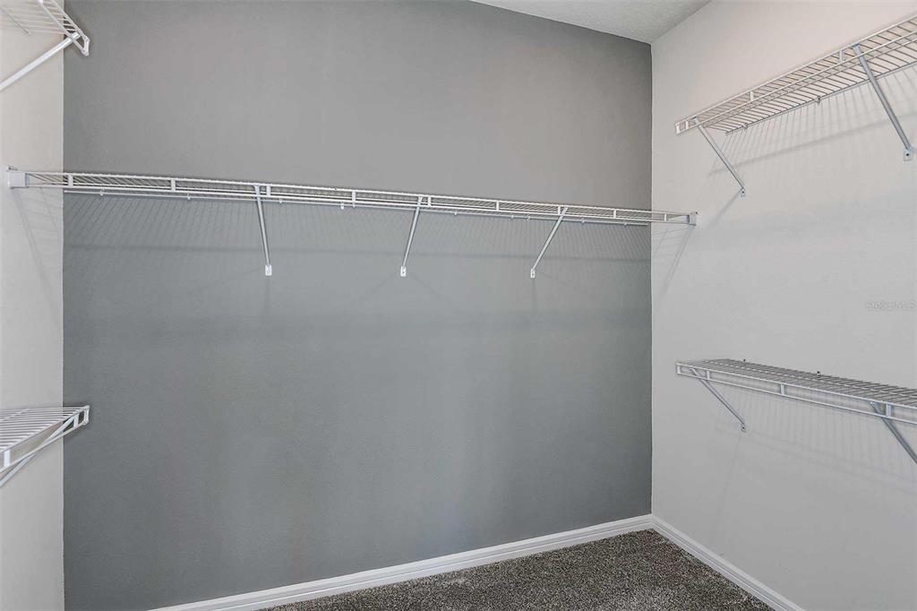 2364 Daisy Tree Road St. Cloud, FL 34771 - Photo 21 of 31 a view of a room with racks on the wall