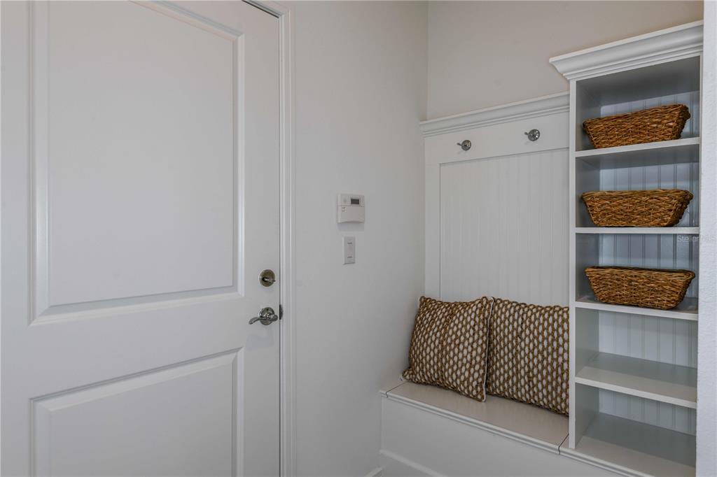 2364 Daisy Tree Road St. Cloud, FL 34771 - Photo 26 of 31 a walk in closet with wooden floor