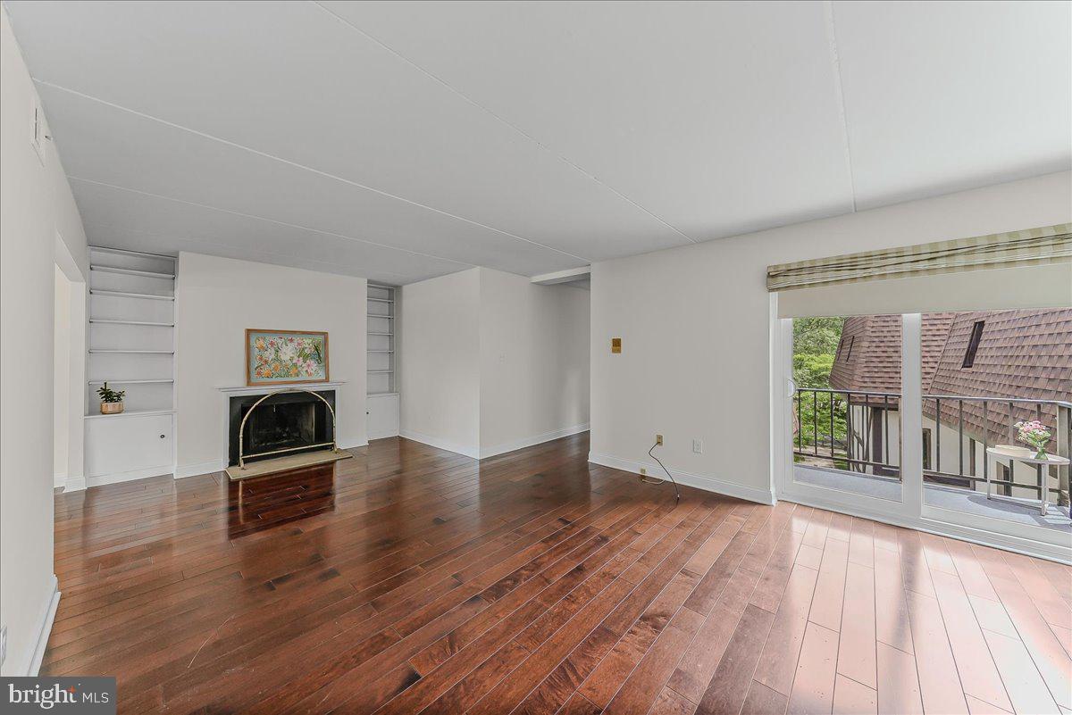 100 Rutgers Avenue, Unit 9 Swarthmore, PA 19081 - Photo 5 of 22 Living Room with Sliding Doors to balcony